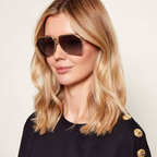 Dolce & Gabbana Gold Brown Sunglasses (DG2326) worn by a model