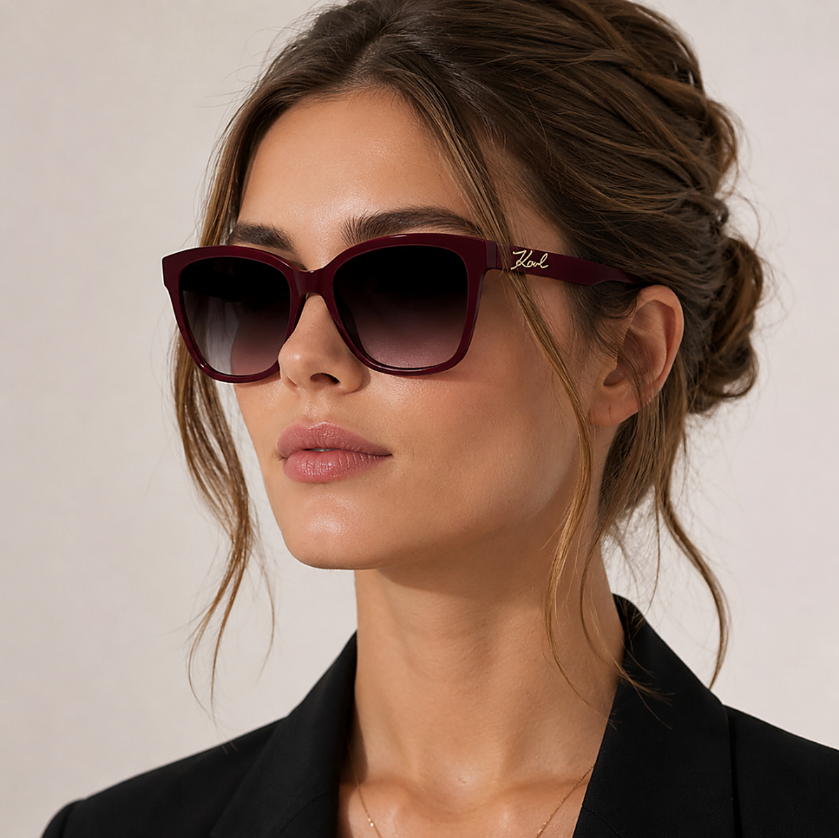 Karl Lagerfeld Red Sunglasses (KL6223S) worn by a model