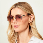 Miu Miu Gold Pink Sunglasses (SMU A57 5AK-40S) worn by a model