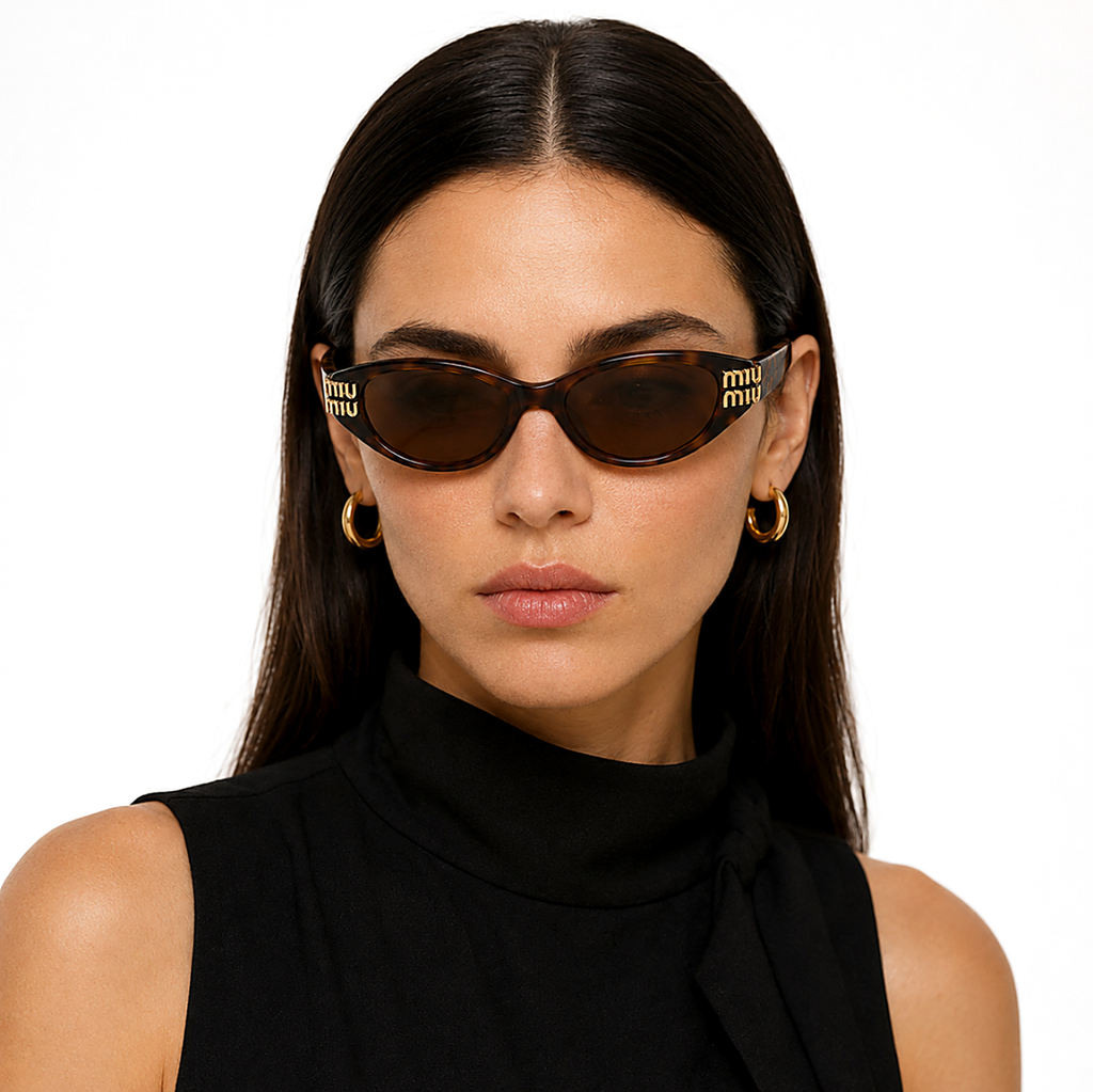 Miu Miu Oval Tiger Sunglasses (SMU B10) worn by a model