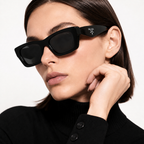 Prada Slim Black Sunglasses (SPR B15) worn by a model