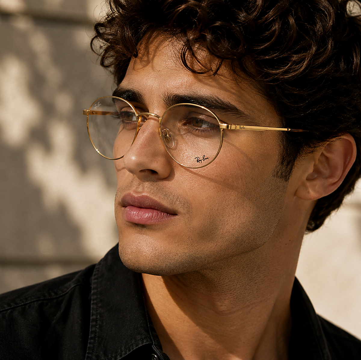 Ray-Ban Gold Round Eyeglasses (RB3681V) worn by a model