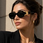 Versace Oval Black Sunglasses (4503-U) worn by a model